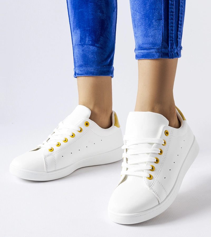 Bílé tenisky s žlutými akcenty Bushnell