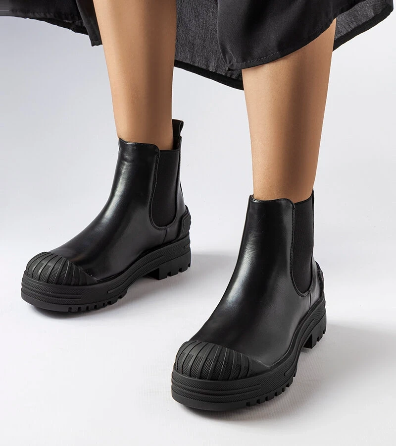 Černé vaky s gumovými vložkami Lange