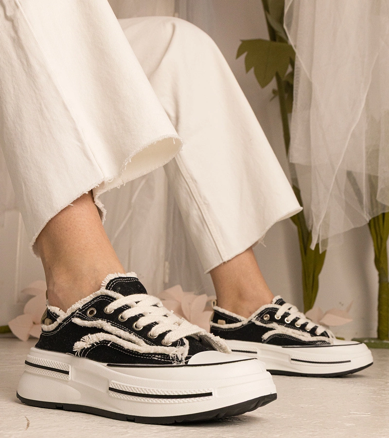 Černé dámské tenisky na vysoké podrážce Kallara