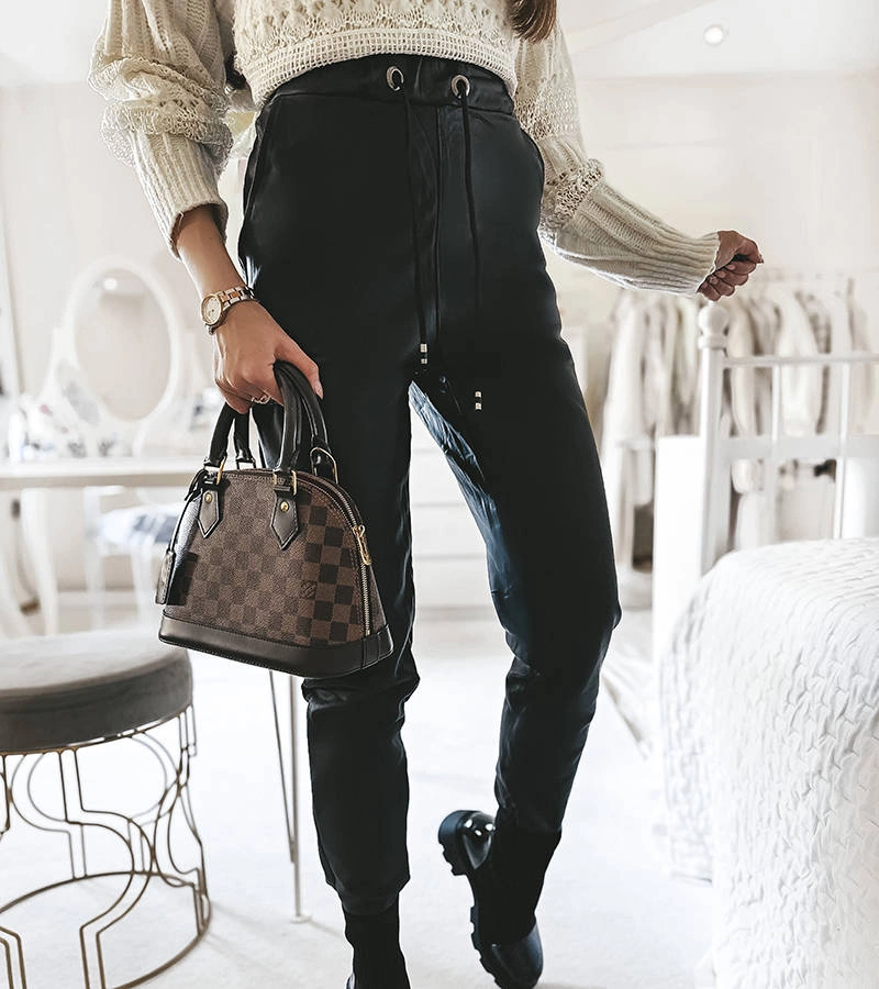 Černé voskované běžecké kalhoty Zane