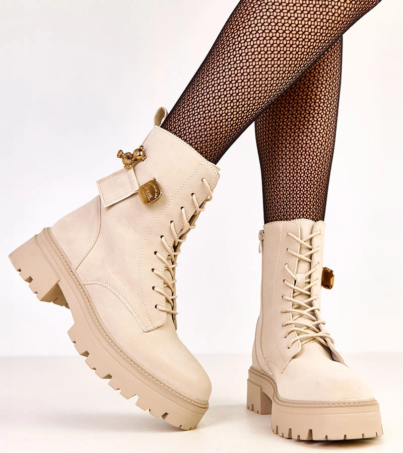 Béžové dámské farmářky zdobené zlatým medvídkem Valery