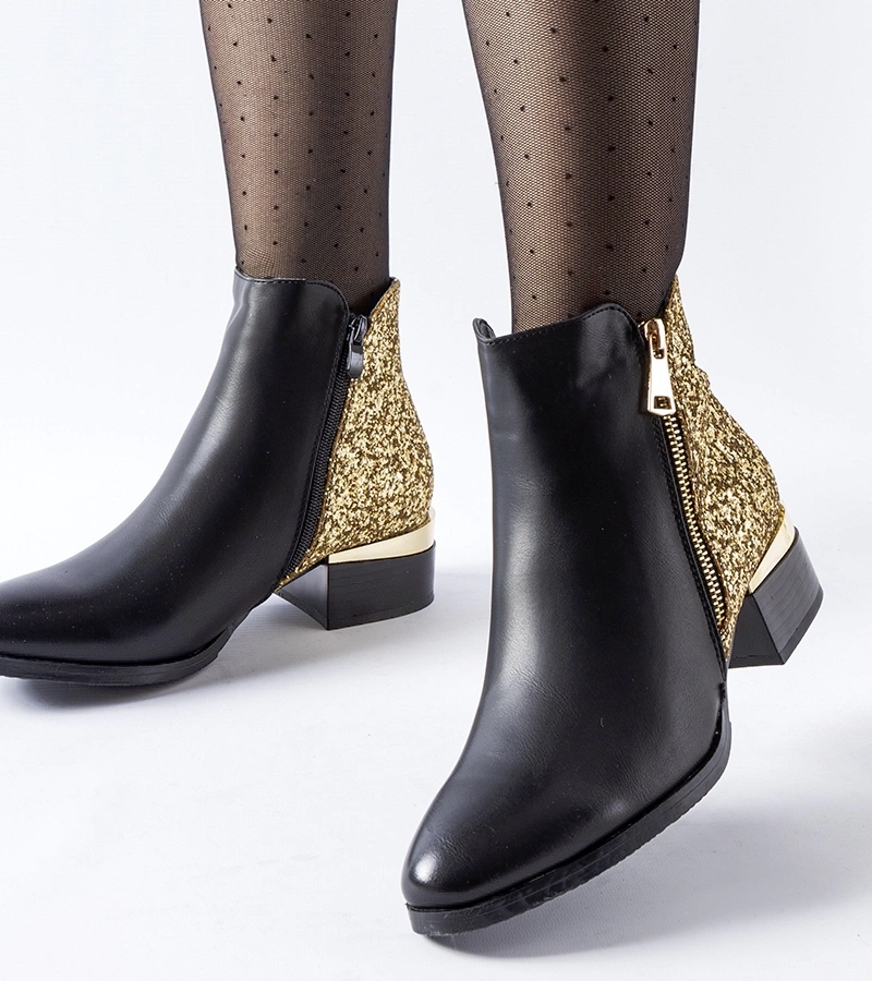 Černé zateplené kotníčkové boty s ozdobnou zadní částí Olindo