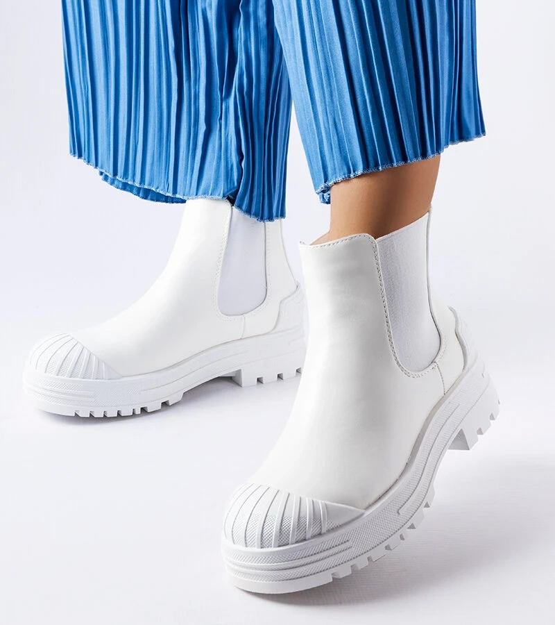 Bílé pytle s gumovými vložkami Lange